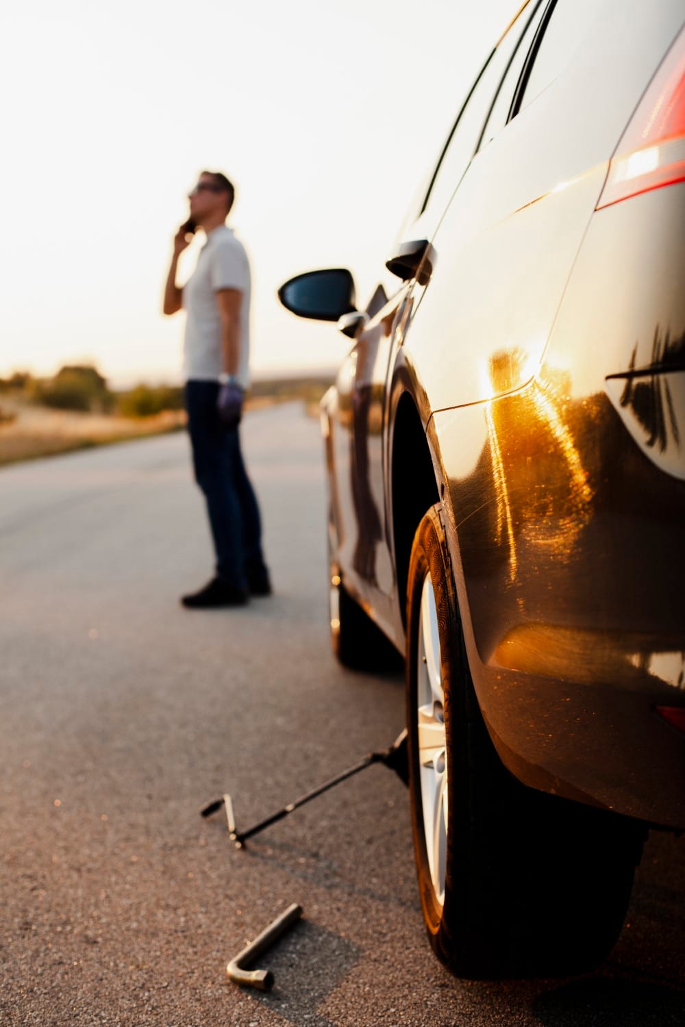 man talking phone about car problem